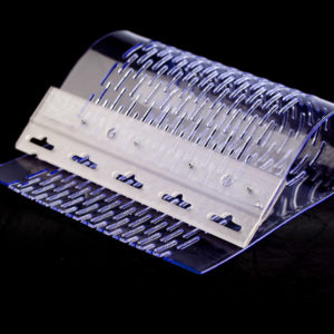 Clear pale blue pvc curtain on metal hanging plates